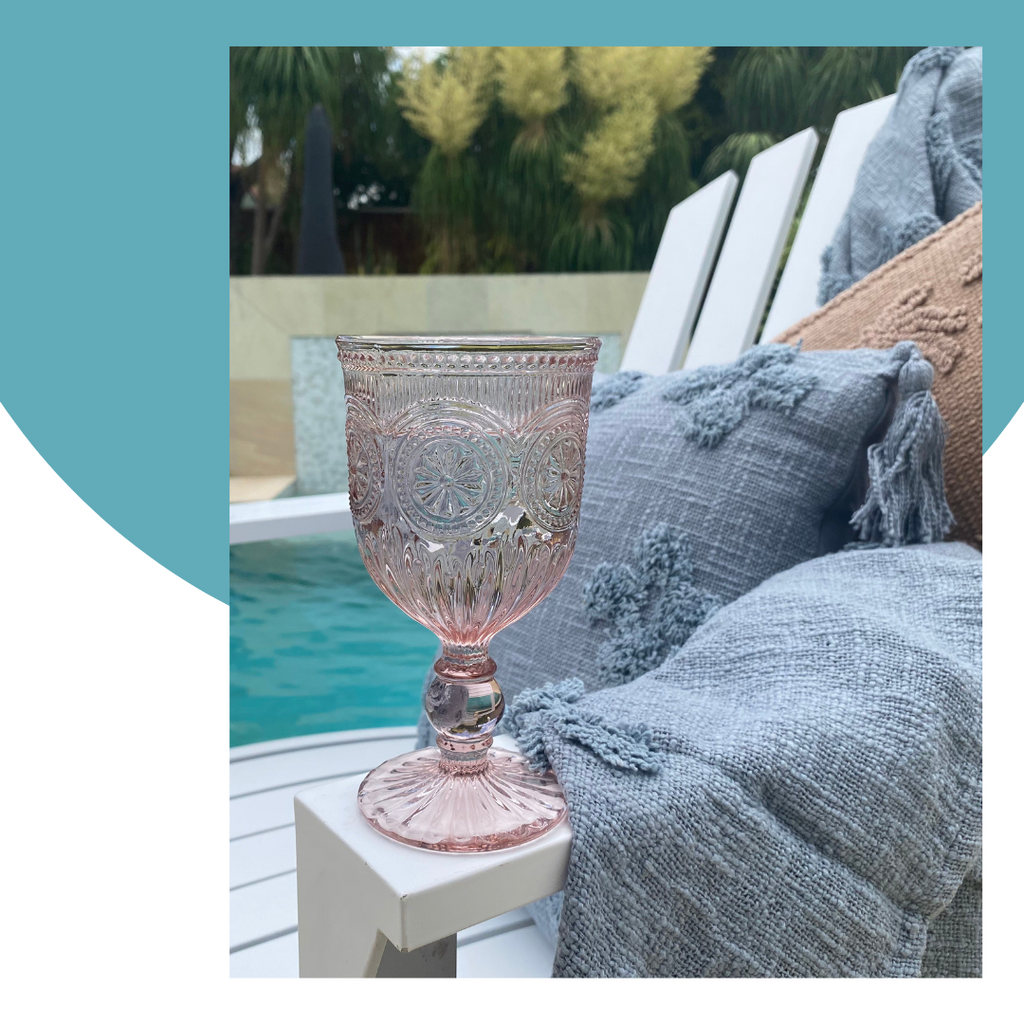 Retro Vintage-inspired Pink Goblet Glass And Rustic Blue Cushion And Throw Poolside Home Decor Australia | Bliss Living at Home